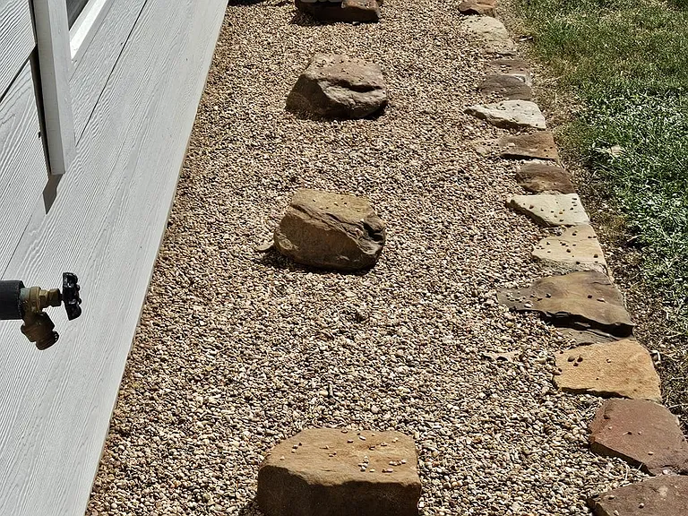 Backyard rock bed.