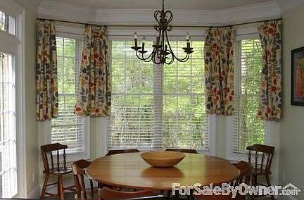 Spacious eating area : Natural light abounds in this spacious eating area that seats 10-12.
