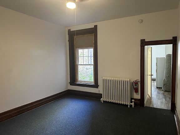 3rd image of 115 E 3rd St #0