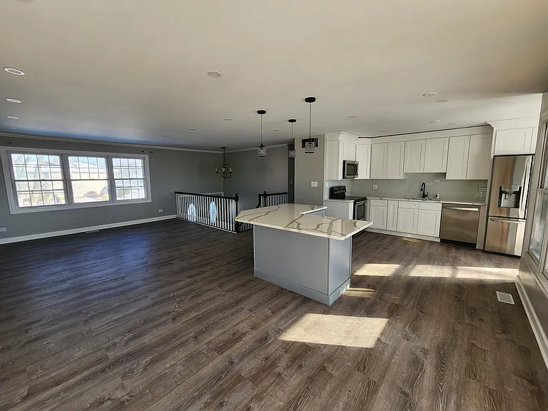 Second Floor: view from other side of Kitchen, Dining Room, and Living Room.