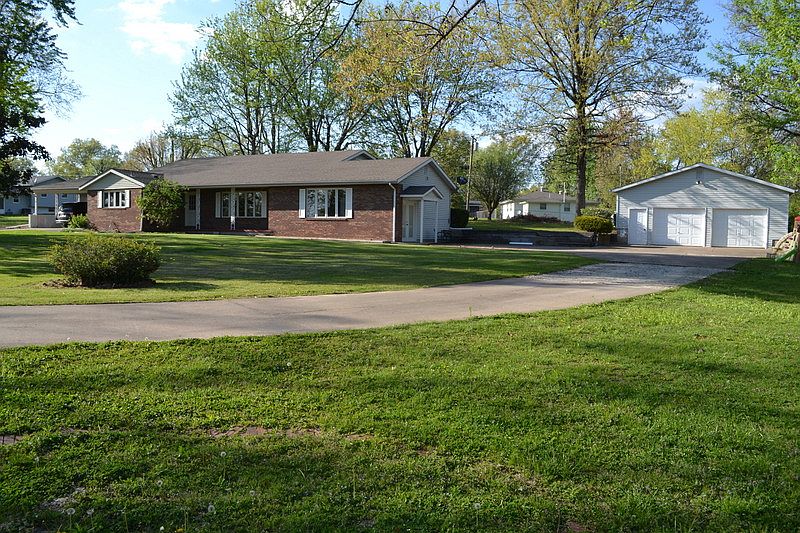 Front of the house and 2 Car Garage