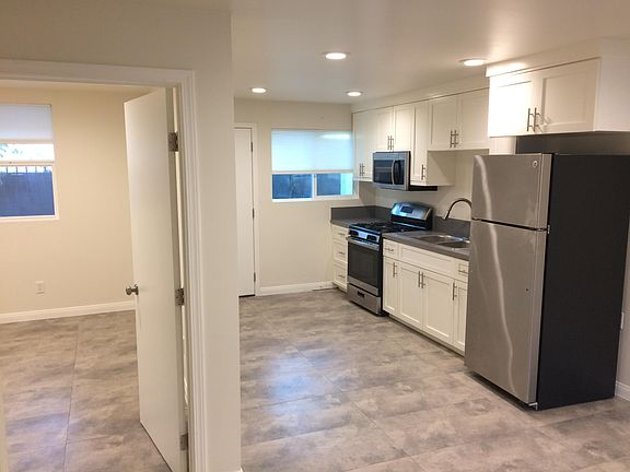 Bedroom to Left. LIVING/KITCH to right.