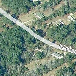 wooded lot at center left