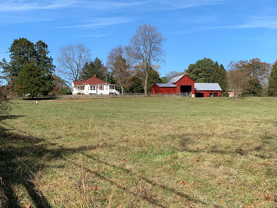 House, barn and fenced pasture, located on nearly 50 acres of undeveloped land, but within minutes of both Route 95 and Route 1.