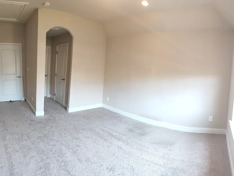 Suite 2, at the top of the staircase, includes your attached, private bathroom and closet. The open bedroom space is perfect for a variety of bedroom furniture configurations.