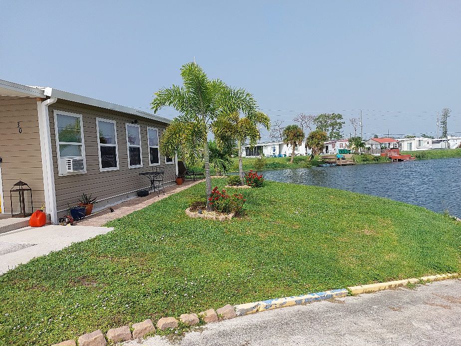 Side yard..boat ramp s in the fore ground