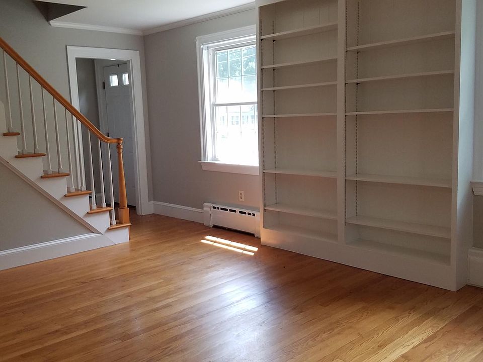 large living room with hardwood floors