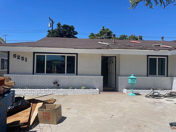 Large driveway area, soon to be clear of all debris and to feature a new roof!