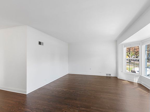 5th image of 7106 N Melvina Ave