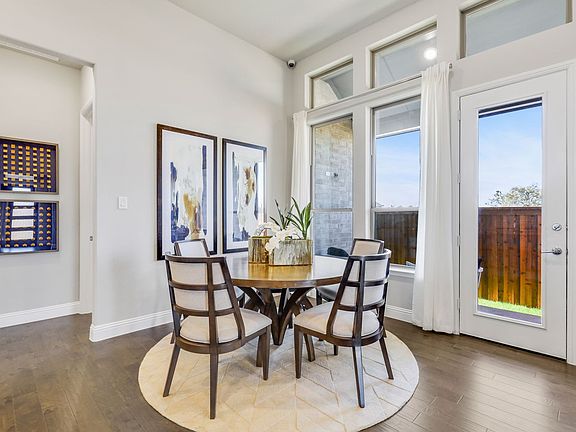 Dining room in the Pinot home plan by Trophy Signature Homes - REPRESENTATIVE PHOTO