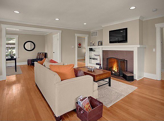 Gracious Formal living area with tiled fireplace