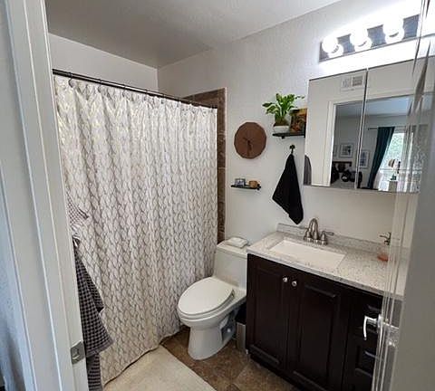 Master bath.. tile floor & tile shower.