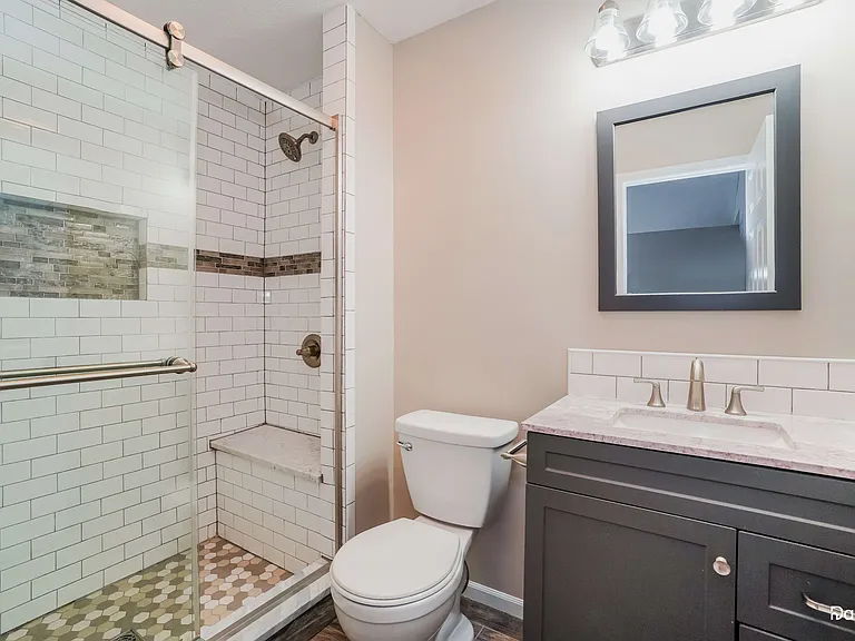 405 Flat River St — Photo 13