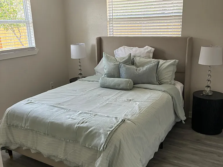 Quiet bedroom with clean lines, a solid retreat at the end of the day.