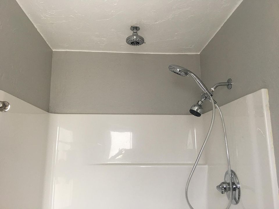 1st floor shower, 3 shower heads. Bath tub/shower upstairs 