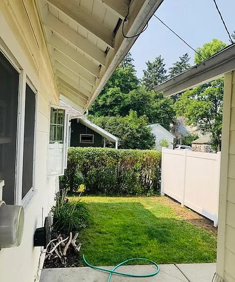back patio and yard to 2 car detached garage