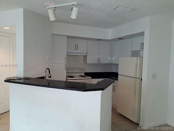 2nd image of 3360 Pinewalk Dr N APT 1318