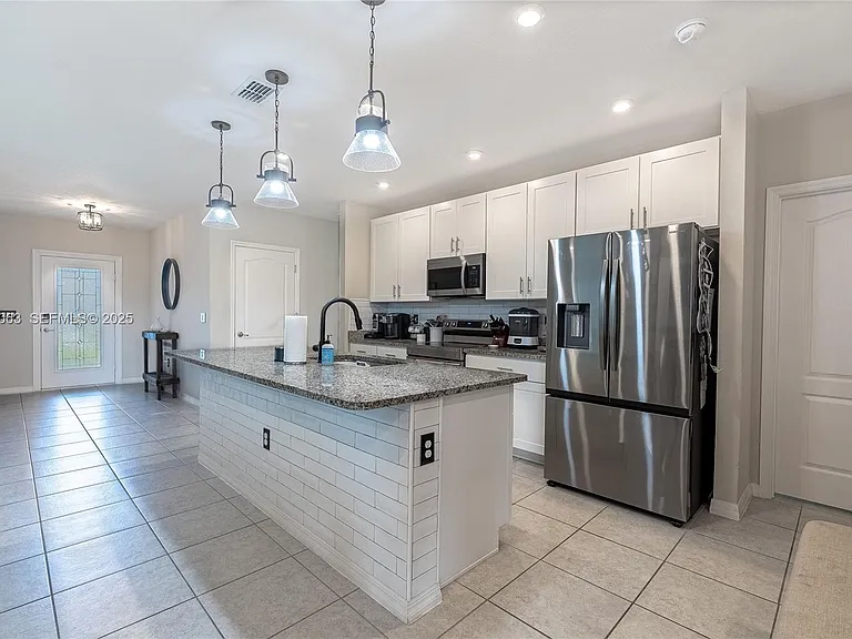 10609 SW Vasari Way — Photo 3