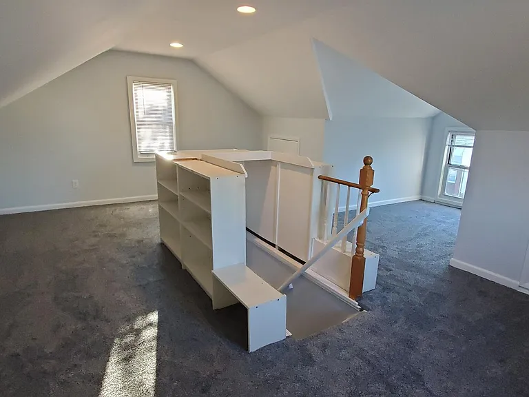 The finished attic makes a great office away from the noise, or a dream bedroom for a kid.