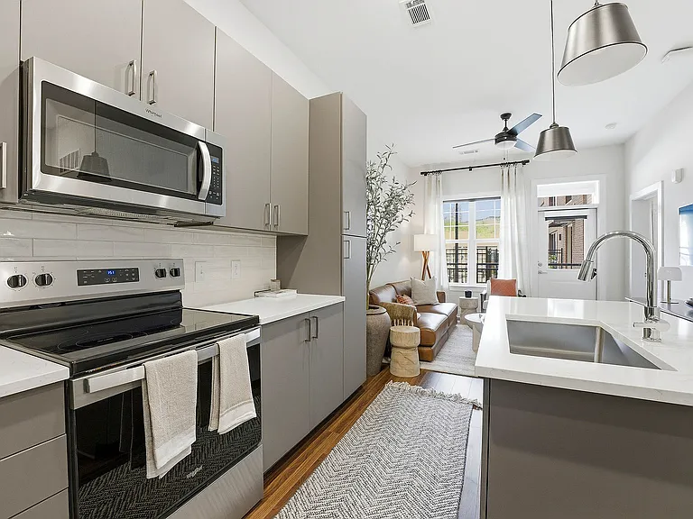 Kitchen with premium materials and window with natural view