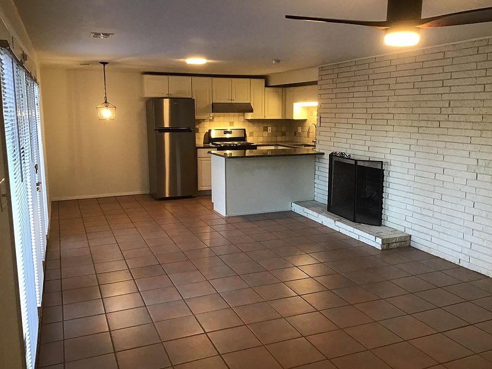 fireplace in decorative split-brick wall