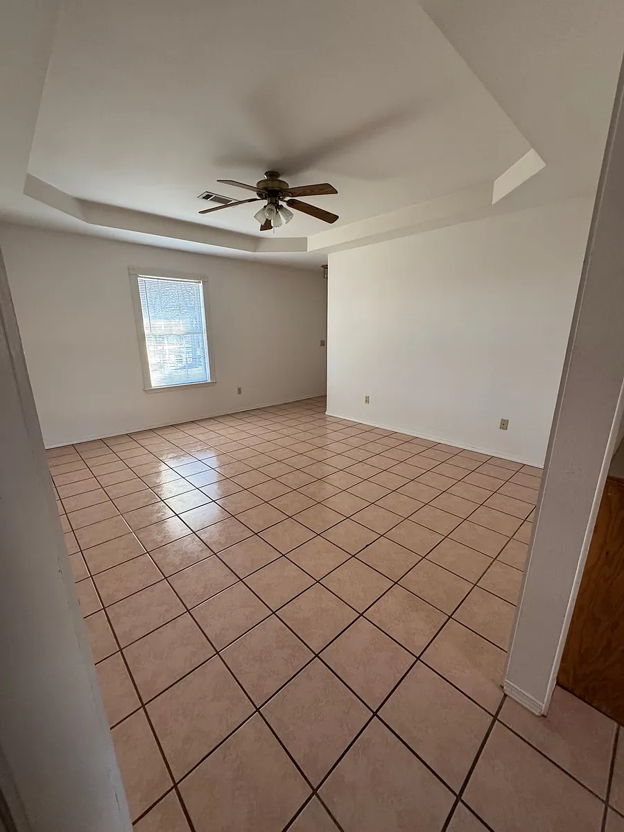 Living room with front door access to the porch - 11523 Highway 352 #5
