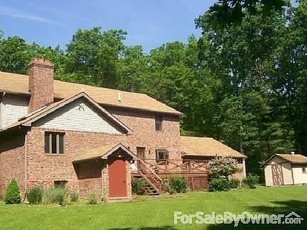 Front of House
						:
						Stately Sunny Brick Home that requires little maintenance