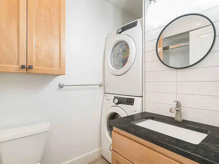 Full sized washer & dryer in the bathroom