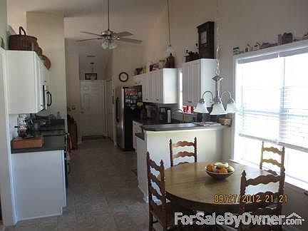 Kitchen Area
						:
						Stainless Steel Appliances, Beveled Countertops