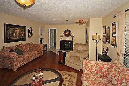 Newly installed hardwood floors in the living room.