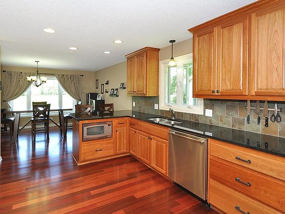 Wow! Impressive new kitchen offers cherry cabinets and all stainless steel appliances are included!