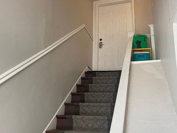 Stairs to front apartment front entrance