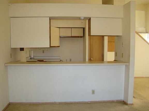 Kitchen with high top breakfast nook. New pics of updated kitchen coming soon!