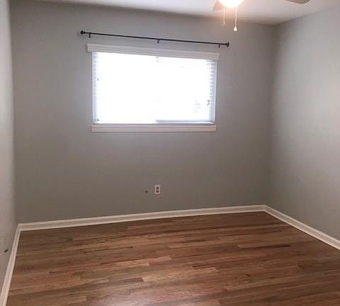 Bedroom One with new ceiling fan