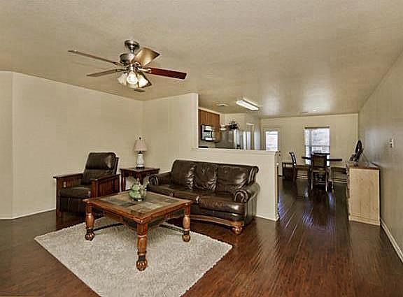Large Living area open to the kitchen with new hardwood floo
