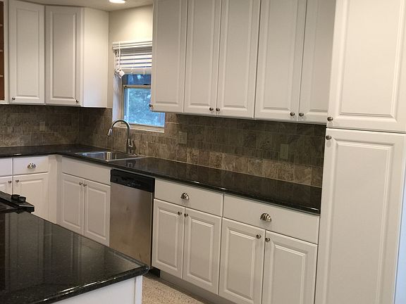 newly remodeled kitchen cabinets & granite counter top