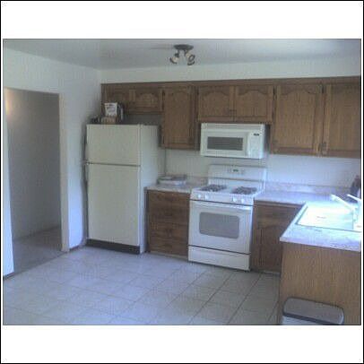 Kitchen with New Appliances and Refinished Cabinets and new lights