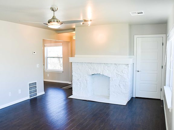 living room with non working fireplace