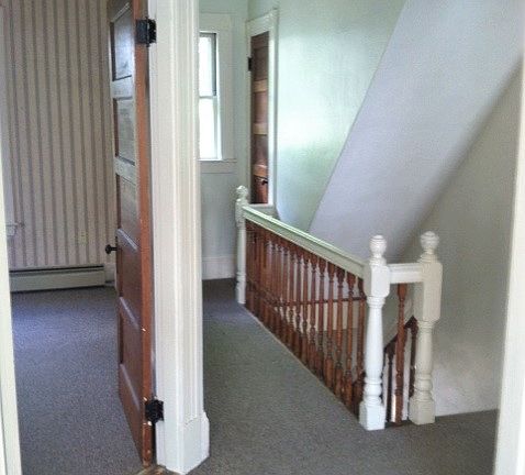 View from top of stairs @ Entry and Side of Bedroom #2