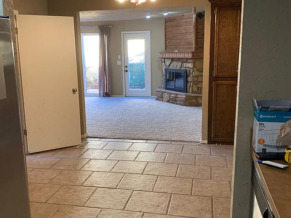 Kitchen looking into dining & family room