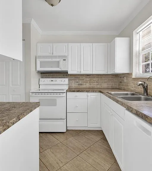 261 NE 42nd St — Photo 3