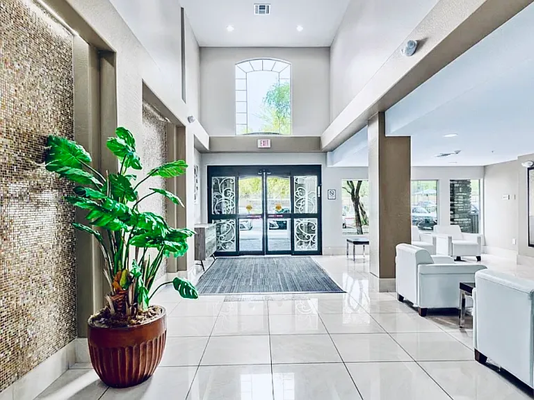 Private entry to conod. Secured glass doors.