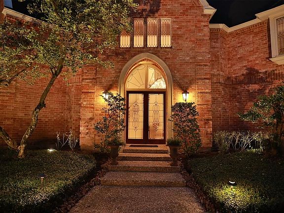 BEAUTIFUL LEAD GLASS FRONT DOOR WITH PALLADIUM LEAD GLASS WINDOW ABOVE
