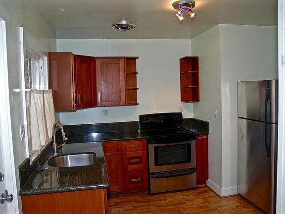 Granite Kitchen with Stainless Steel Appliances