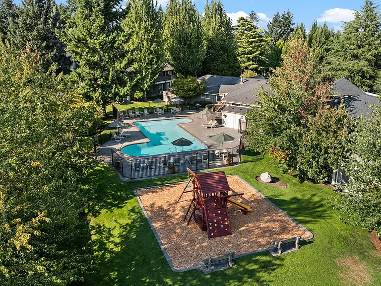 Resort-style pool and family-friendly playground just steps from home