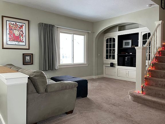 Front room with built in entertainment center