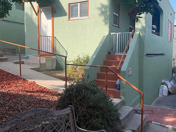 Cottage stairs up to balcony/deck