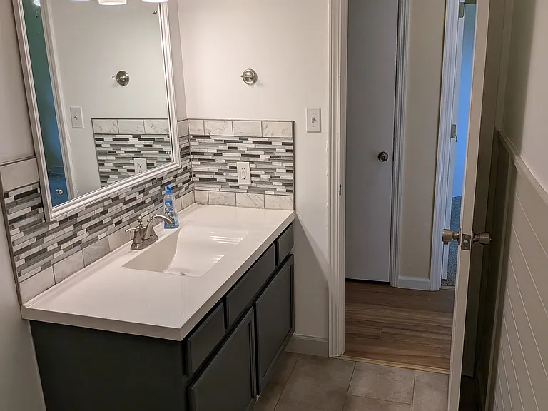 Bathroom looking into hallway