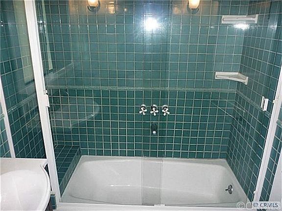 updated bathroom, sitting area with large shower
