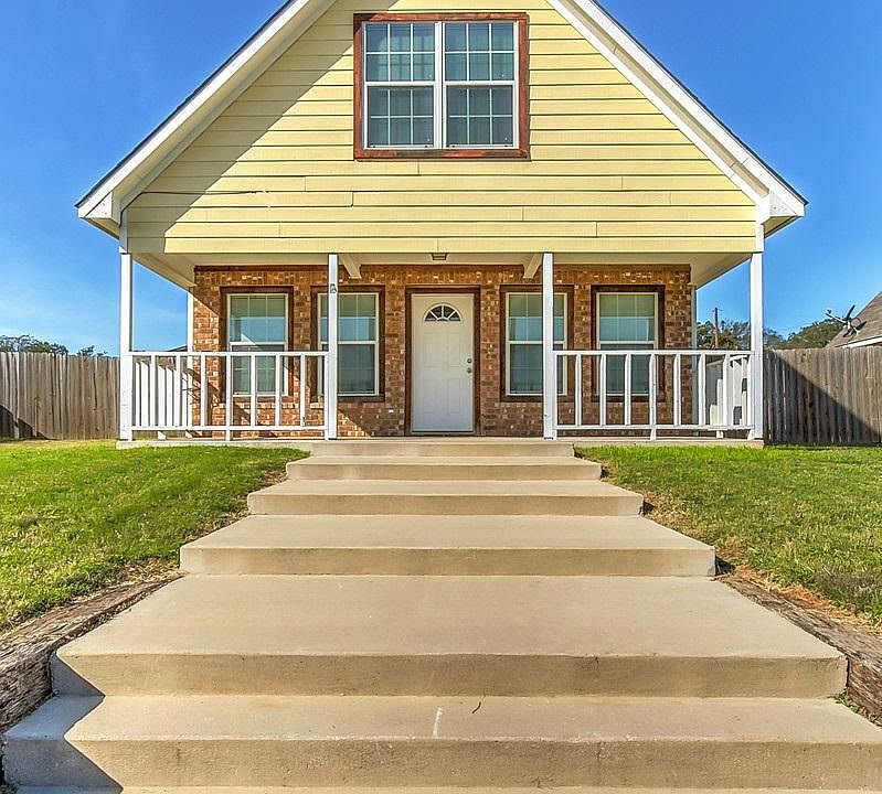 Front exterior, large covered porch